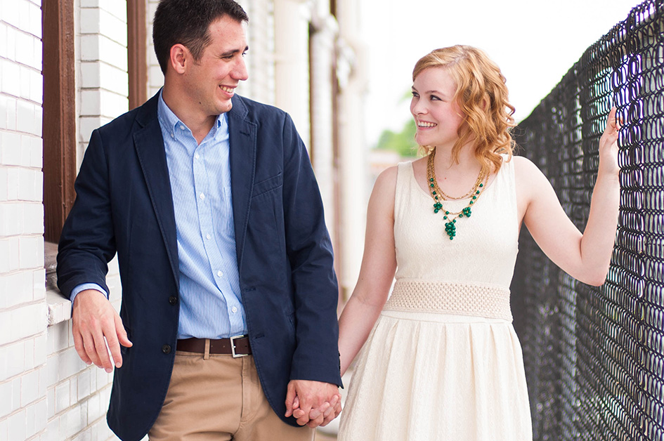 Engaged Couple holding hands